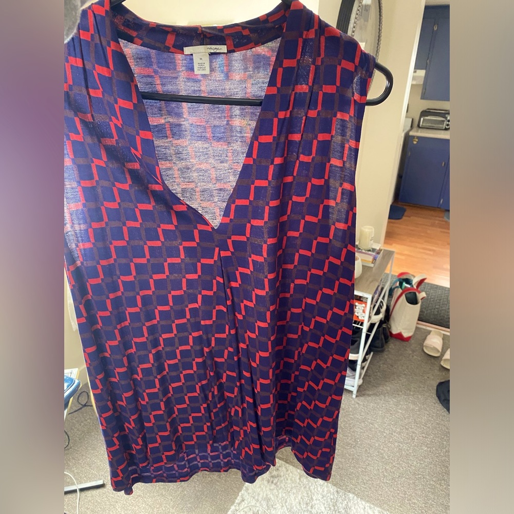 Nave and red shirt